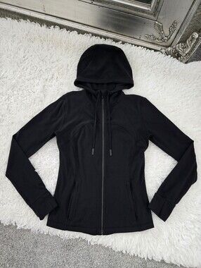 Lululemon Black Define Hooded Jacket. Size 8. Good preowned condition.